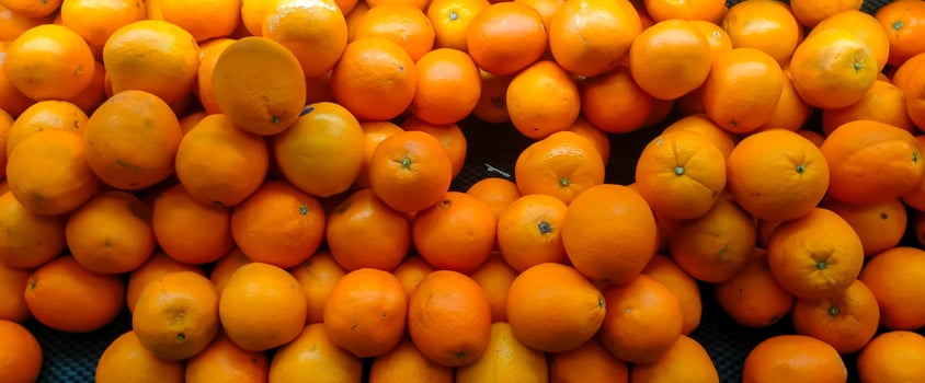 Full frame shot of oranges for sale at market stall photo