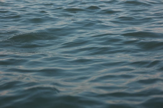 Blue water wave background, blue sea background, ocean waves photo