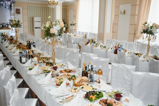 beautifully laid tables with glasses and appliances at morning in restaurant photo