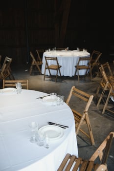 beautifully laid tables with glasses and appliances at morning in restaurant. photo