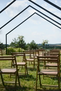 wonderful wedding ceremony. trendy wedding arch made according to modern fashion. wedding decorations photo