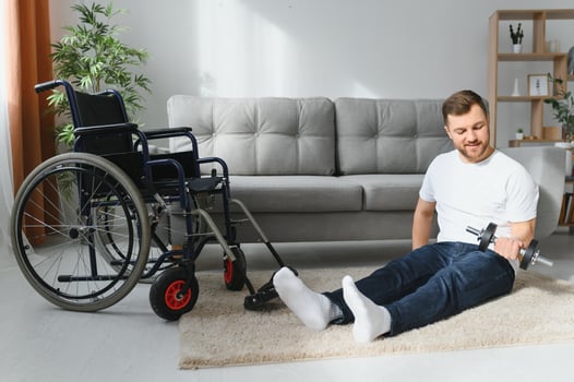 Disabled sportsman doing stretching and exercises on wheelchair background. Life of a disabled person photo