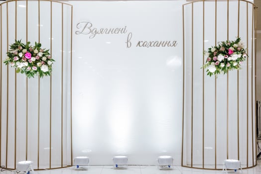 A white background with a gold frame photo