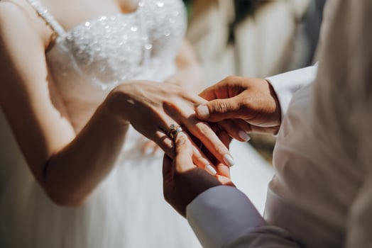 A man and woman are getting married photo