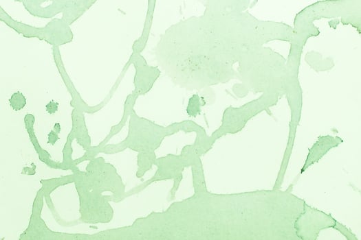 Watercolor green splashes dilution spots background. photo