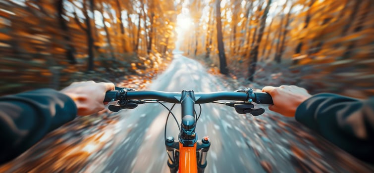 Bicycle Riding Photo. Close Up of Hands on Bicycle Handlebar in the Autumn Forest. Blurred Forest Background. Sunny Day. High-Speed Bicycle Riding Background. photo
