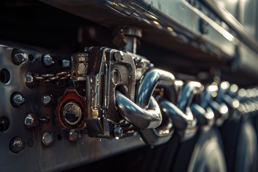 Secure Truck Cargo Chain Mechanism Close-up, Close-up image of a secure cargo chain mechanism on a truck, highlighting the robustness and safety in transport. photo