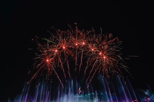 The colorful display of fireworks celebrates the fun and happiness of the night. photo