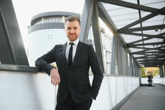 Portrait of an handsome businessman in an urban setting photo