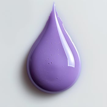 purple paint drop isolated on white background with shadow. purple paint explosion photo