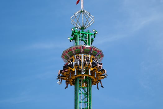 fall tower swing free fall in the sun shoot a beautiful on your mobile phone Cloverdale rodeo country fair get back to Country family events the rays of sun break through the swing ride, great photo