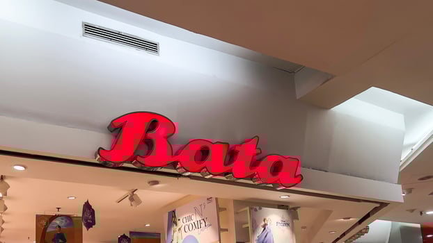 Interior view of Bata store in shopping mall Bekasi. Bata is a family-owned global footwear and fashion accessory, founded 1894. Bekasi, Indonesia, May 1, 2024 photo