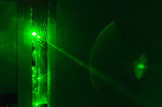 Green laser beam of the security system photo
