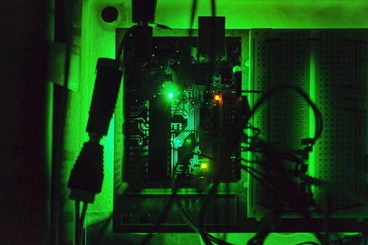 ICs and wires with green backlight photo