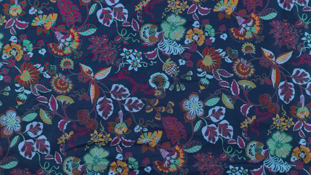 colorful Floral summer fabric pattern. Blue and pink flowers on a black background. photo