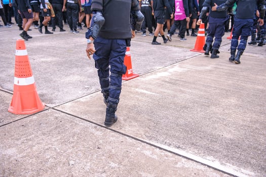 Riot police control the crowd.. photo