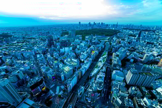 A dusk panoramic cityscape at Shibuya area high angle wide shot photo