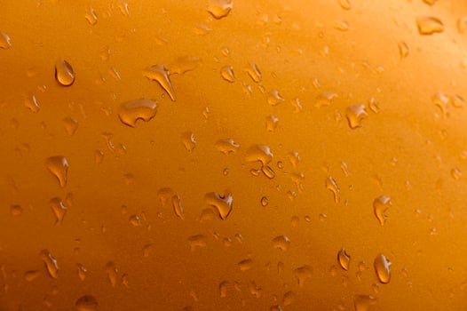 Background - raindrops on the metal surface of a modern car photo