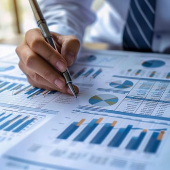 Writing a financial report, business accounting concept. photo