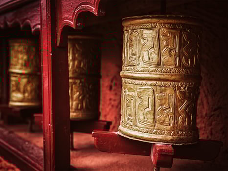 Buddhist prayer wheels , Ladakh photo