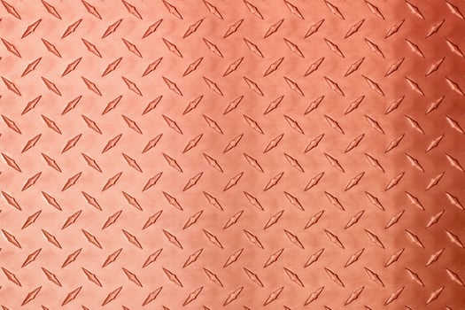copper metal texture with diamond embossed. bronze plate background photo