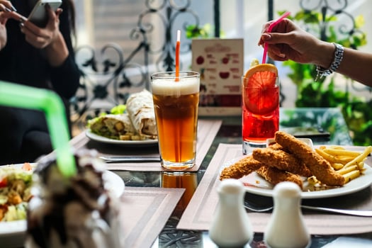 Group of People Enjoying a Meal Together at a Table photo