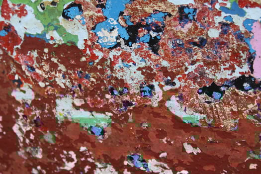 close up of all kinds of paint of a fishing boat photo
