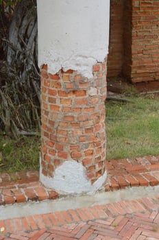 brick pole in the garden photo