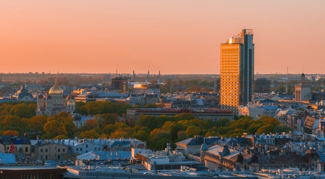 Aerial panoramic sunset over Riga old town in Latvia. Beautiful spring sunset over Riga. Golden hour fire sunset. photo