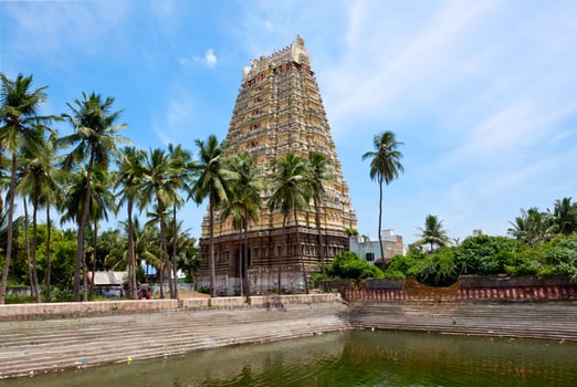 Gopura tower and temple tank of Lord Bhakthavatsaleswarar Temple photo