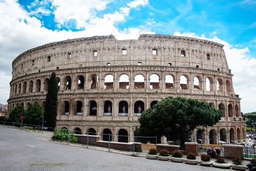 Iconic Colosseum under Blue Sky in Rome photo