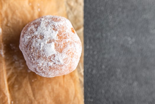 filled donut chocolate filling powdered sugar fresh meal food snack on the table copy space food photo