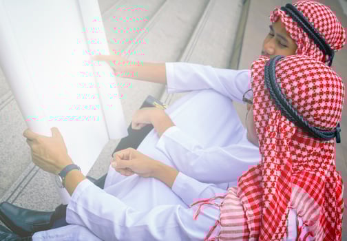In town.Muslim Arab engineer man.They are talking about plant ,exchange information and Targeting . Photo concept with Arab engineer.