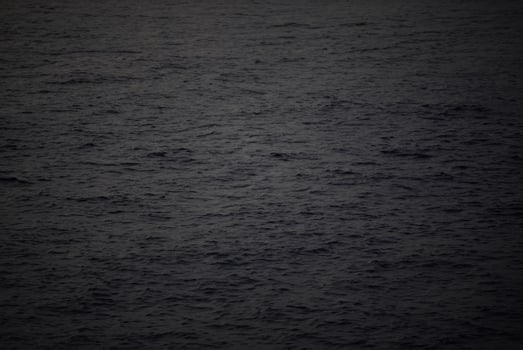 Stunning Image, Dark Silhouette of Ocean Waves photo