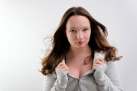 Beautiful young caucasian girl wearing casual sweatshirt hugging oneself happy and positive, smiling confident. self love and self care photo