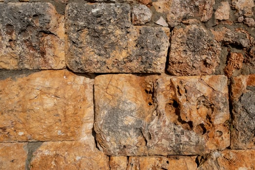 Texture of a stone wall. Old castle stone wall texture background. photo