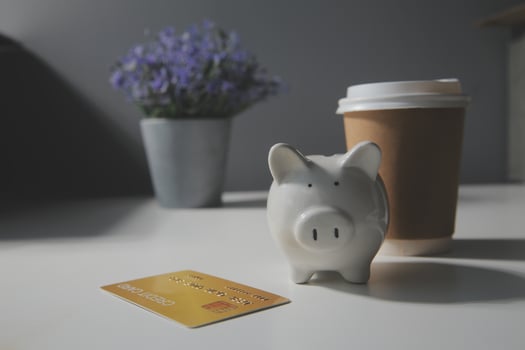 close up on calculator with group of mail letter and credit card at white table for end of the month expense day concept photo