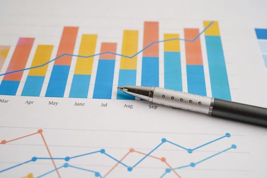 Pen on chart graph paper. Finance, account, statistic, investment data economy, stock exchange business. photo