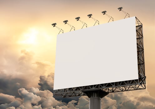Billboard pole with yellow sky background photo