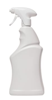 White plastic bottle with spray on an isolated background, container for household chemicals photo