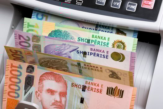 Albanian lek in a counting machine photo