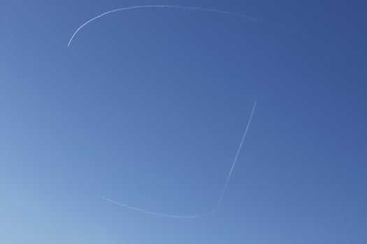 airplane stripes in the air photo