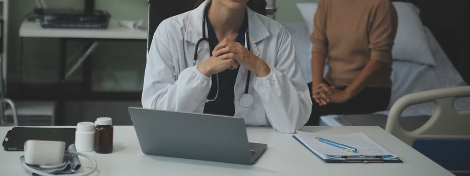Female doctor explaining to patient results of model the process of patients. Diagnosis of diseases for Model Internal organ. photo