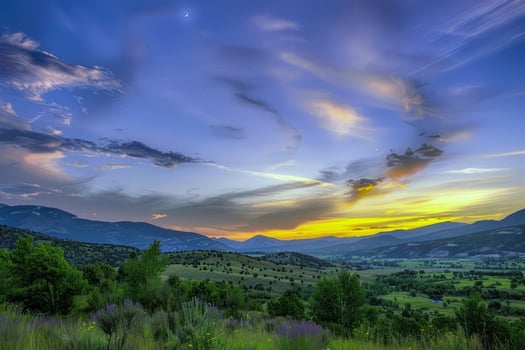 Sunset painting the sky with hues of orange, pink, and purple, signaling the end of summer day photo