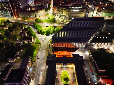 Aerial Night View of Illuminated Central Manchester City and Downtown Buildings, England United Kingdom. May 4th, 2024 photo