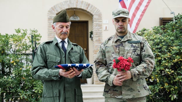 Veteran And Military Son Commemorate The Dead On American Memorial Day photo