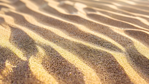 Close-up of sand dune with shadows photo