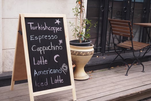 Cafe menu on black board outdoor photo