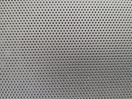A close up of a metal mesh background photo