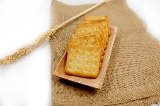 malkist crackers on a white background photo